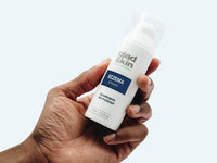hand holding eczema cream product
